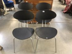 Four retro style chairs.