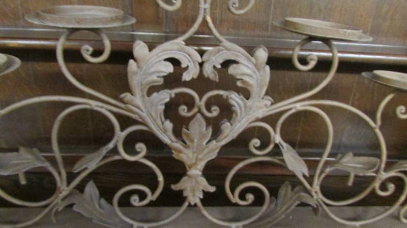 A decorative wrought iron candleholder. (Collect only). - Image 2 of 2