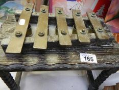 An unusual old brass xylophone.