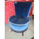 A blue bedroom chair.