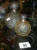 2 silver topped cut glass scent bottles