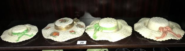 3 pottery bonnet/hat posy holders and 1 wall hanging hat