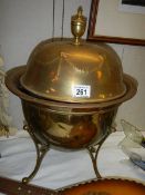 An art nouveau brass coal bucket.