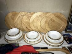 24 piece of Midas porcelain dinner ware & 6 wooden coasters.