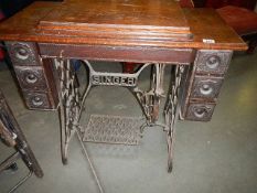 An old treadle sewing machine.