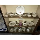 A quantity of mainly W H Goss plates, dishes, cups etc.