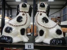 A pair of Staffordshire mantlepiece/fireside dogs