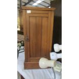 An early 20th century satin walnut pot cupboard. (Collect only).