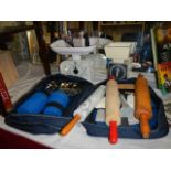 A mixed lot including rolling pins, scales and picnic set.