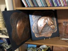 2 hammered copper plaques of a horses