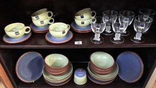 A large quantity of Denby, including plates, bowls,