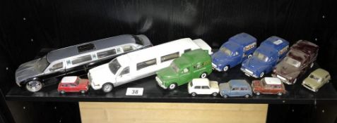 A quantity of unboxed diecast Morris Minor vans and Mini model cars