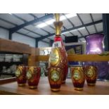 A Victorian gilded hand painted glass decanter and 6 glasses