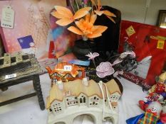 A mixed lot including Christmas decorations, cottage ware teapot etc.