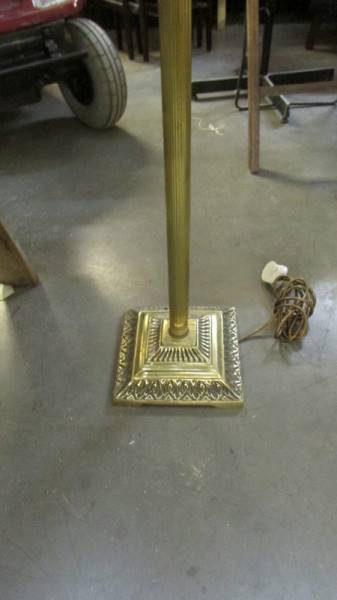 A brass standard lamp with reeded column complete with shade. (Collect only). - Image 2 of 3