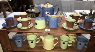 A good lot of new and unused Denby, cups and saucers, mugs, teapot, sugar bowl, milk jug etc,