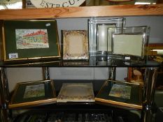 A quantity of pictures and frames.