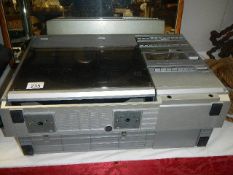 A retro Sharp both sides play disc stereo system, V2-3500.
