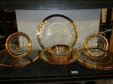 A gold rimmed cake stand,