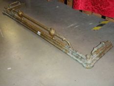 A Victorian / Edwardian brass fender.