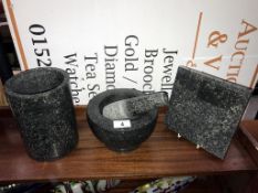 A granite pestle and mortar,