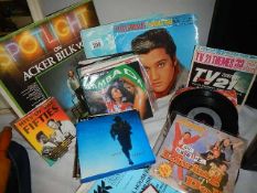 A quantity of LP and 45 rpm records including Elvis.