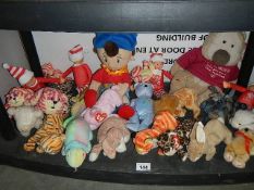 A shelf of Ty 'Beanies' and other soft toys.