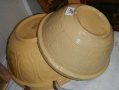 A large T G Green mixing bowl and one other.