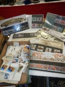 A selection of loose stamps and presentation sets