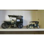 A large tin plate Model T Ford van and a Plastic Ford Model T, made in Spain.