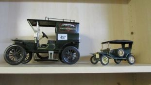 A large tin plate Model T Ford van and a Plastic Ford Model T, made in Spain.