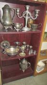 A mixed lot of silver plate including candelabra.