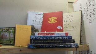 A quantity of atlas and map books.