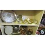 Two shelves of miscellaneous metal ware including picture frames, brass industrial door handles,