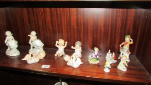 A mixed lot of porcelain figures,