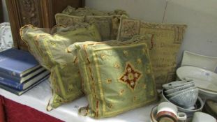 6 cushions including tapestry, 2 new marked English Home E905T Helen Net Terracotta priced at £115.