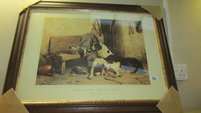 A framed and glazed print of 'gundogs with the days bag' by John Sargent Noble