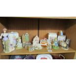 A mixed lot of ornaments including buildings, figures, small clock, (some in boxes).