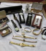 A mixed lot of ladies and gents wrist watches.