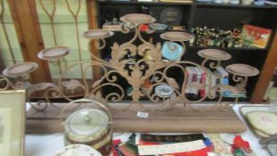 A large wrought iron candle holder.