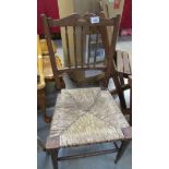 A rush seated kitchen chair.