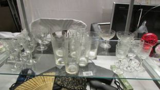 A quantity of vintage drinking glasses