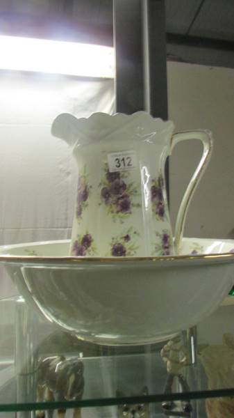 A large purple floral Burleigh ware bathroom jug and bowl