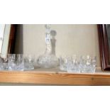 A cut glass decanter and 6 whisky glasses