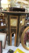 An oriental octagonal table. (Collect only) ****Condition report**** Height 50cm.