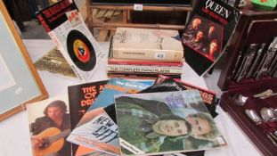 A quantity of music related books including violin, piano, Beatles, Queen etc.