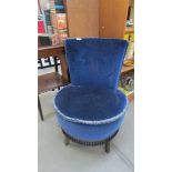 A blue plush bedroom chair. (collect only).