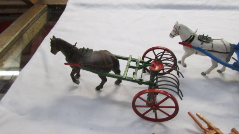 Two Britain's farm carts and a hay rake all with plastic horses. - Image 3 of 3