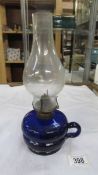 A Victorian Bristol blue glass finger oil lamp.