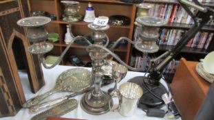 A silver plate candelabra and other silver plate.